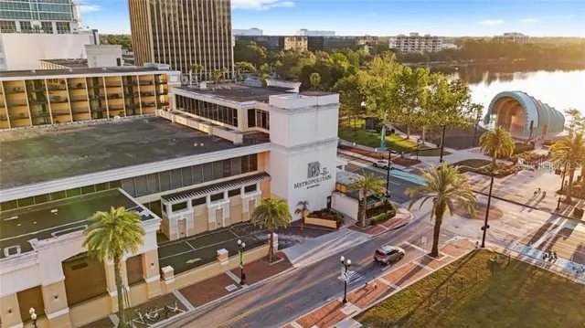 a view of a balcony with two chairs and a table