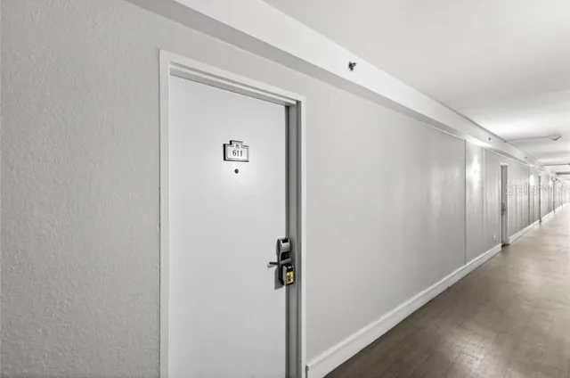 a view of a hallway with closet