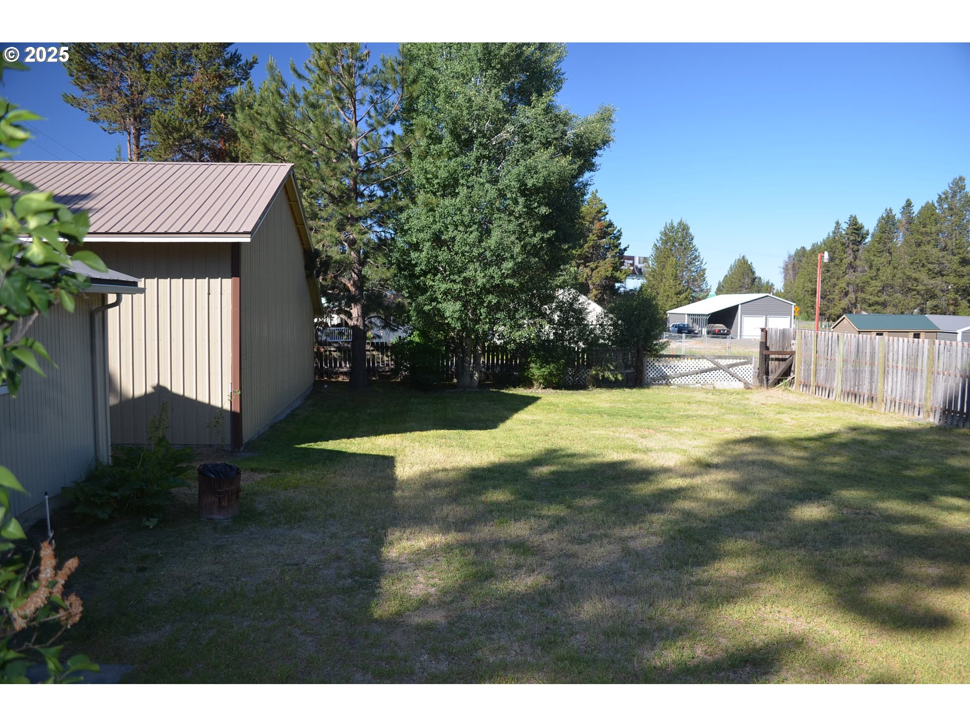 137008 Main Street Crescent, OR 97733 - Photo 34 of 46 a view of a house with backyard and garden
