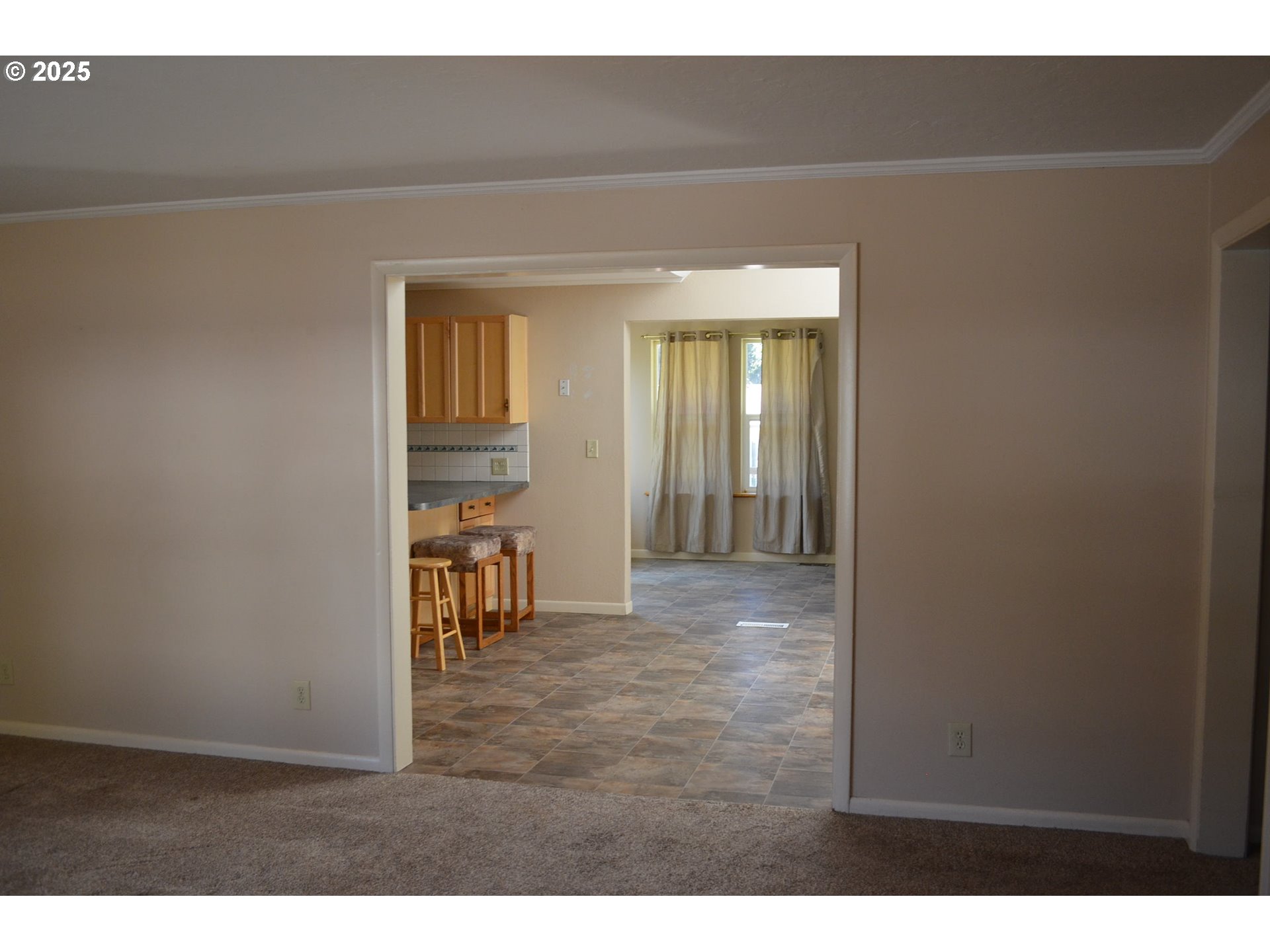 137008 Main Street Crescent, OR 97733 - Photo 5 of 46 a view interior of livingroom and dining room with wooden floor