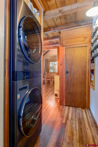 a view of a hallway with washer and dryer
