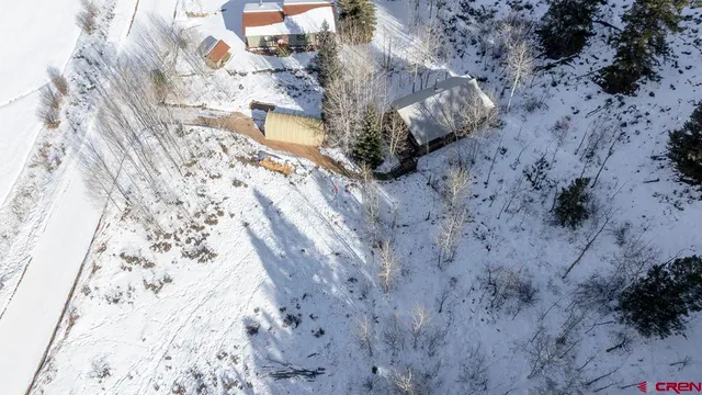 a view of mountains with an outdoor space