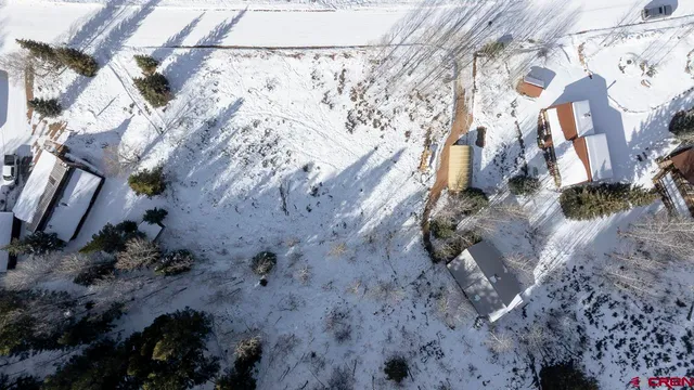 a view of a backyard of a house