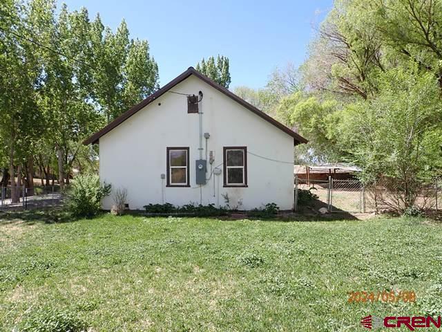 21196 Lanning Road Austin, CO 81410 - Photo 6 of 12 a view of a backyard with a garden