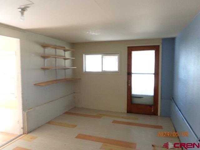 21196 Lanning Road Austin, CO 81410 - Photo 10 of 12 an empty room with windows