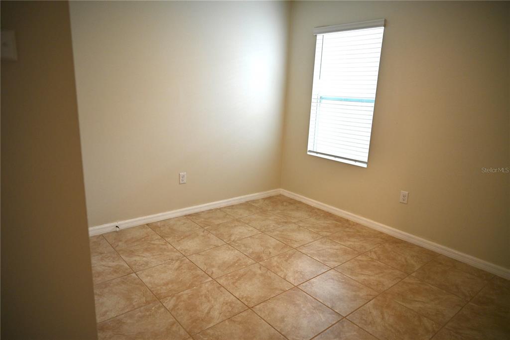 1036 Bethpage Road Auburndale, FL 33823 - Photo 11 of 18 an empty room with a window