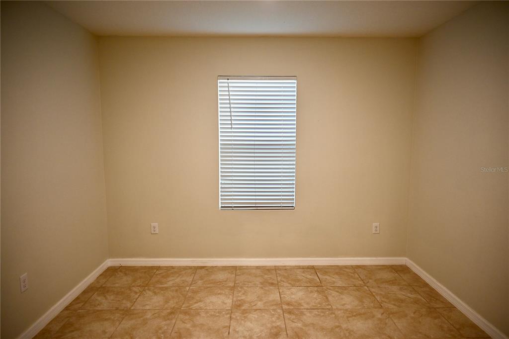 1036 Bethpage Road Auburndale, FL 33823 - Photo 16 of 18 an empty room with a window