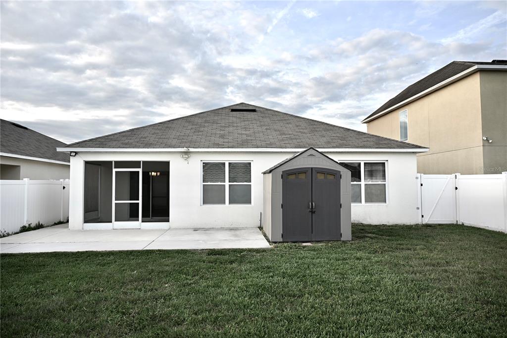 1036 Bethpage Road Auburndale, FL 33823 - Photo 18 of 18 a front view of house with yard