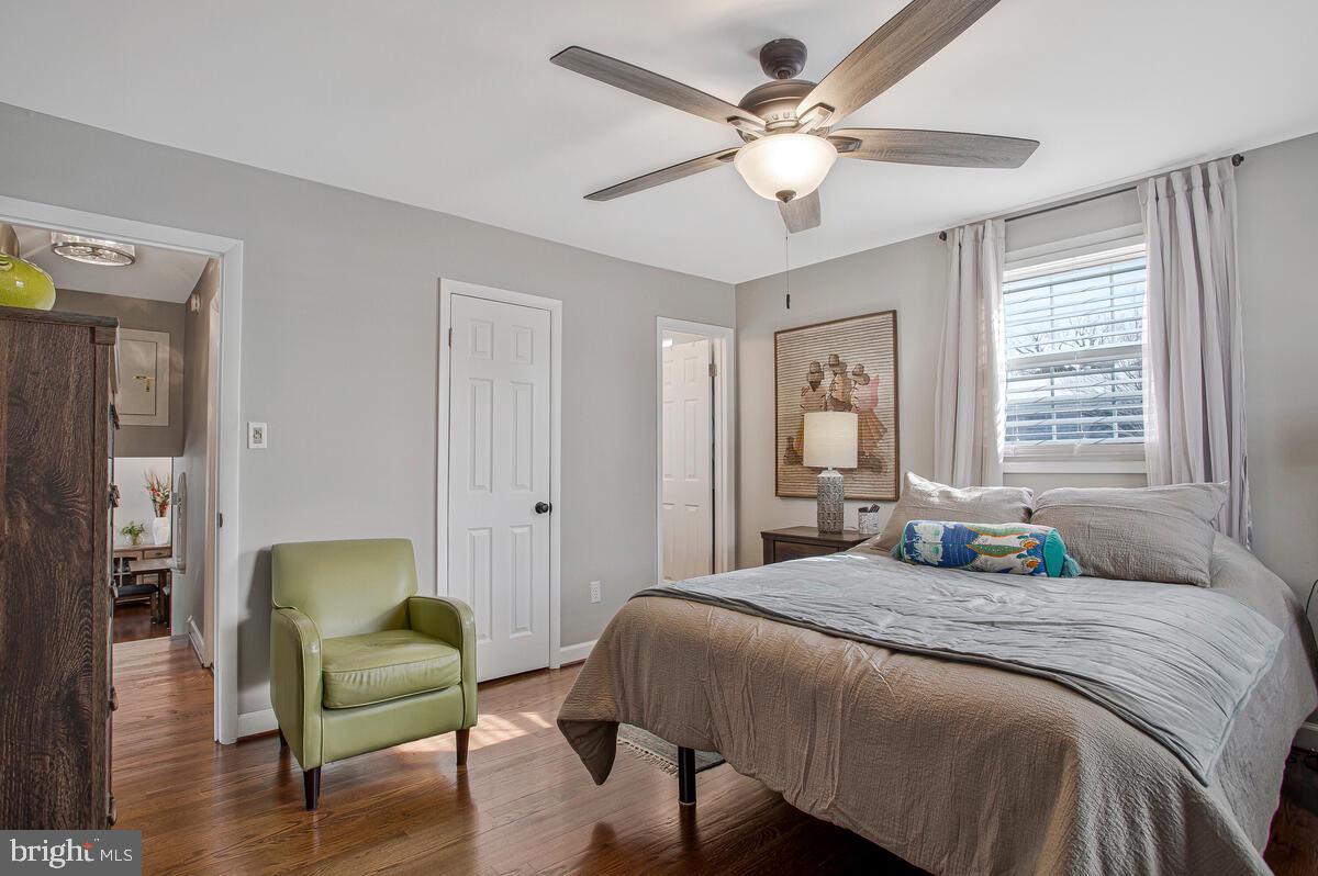 6617 Northgate Parkway Clinton, MD 20735 - Photo 20 of 36 a bedroom with a bed and a chandelier