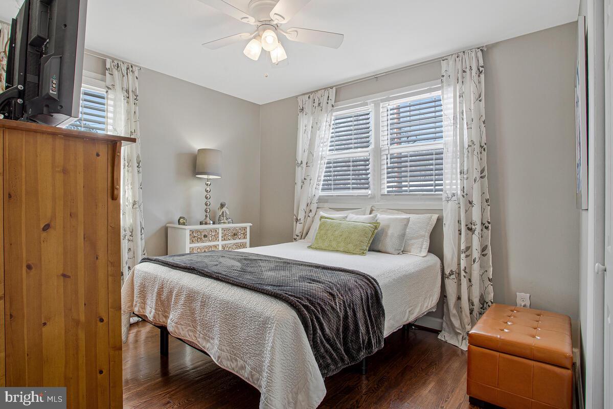 6617 Northgate Parkway Clinton, MD 20735 - Photo 25 of 36 a bedroom with a bed and a couch