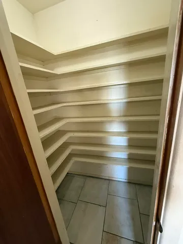 a kitchen with stainless steel appliances a sink and cabinets