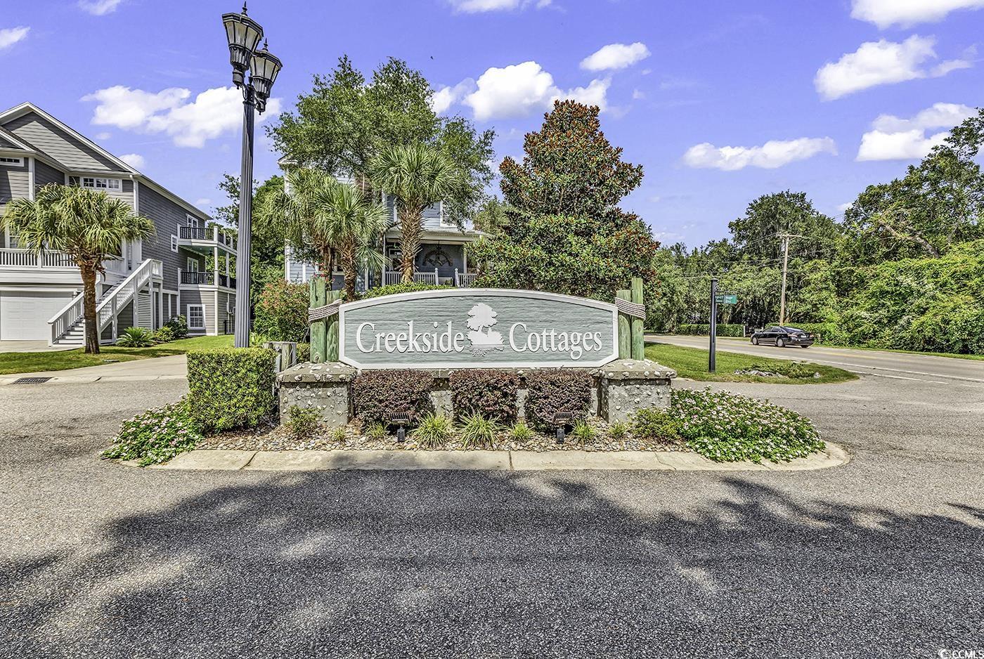 6 Cottage Drive Murrells Inlet, SC 29576 - Photo 30 of 31 View of yard featuring a patio