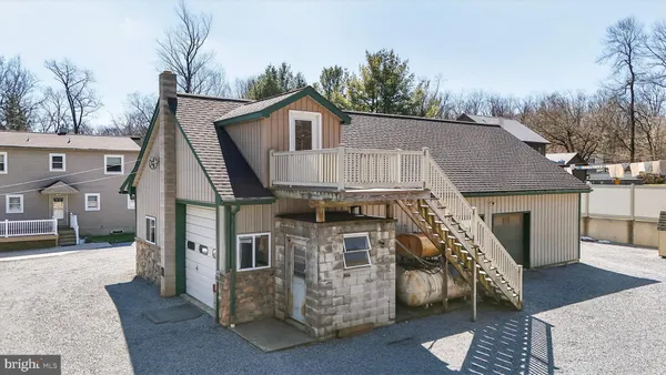 a view of a house with a swimming pool