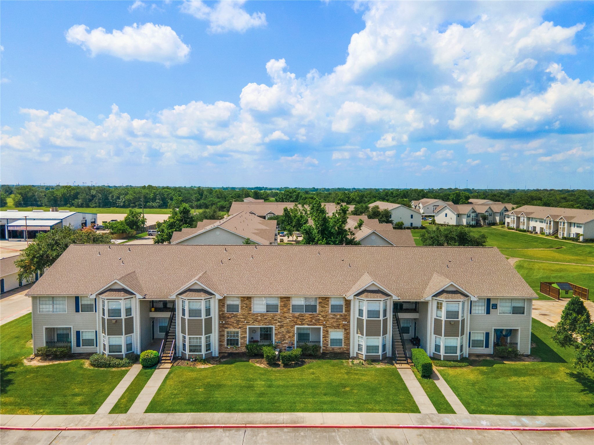 3419 Fountains Drive, Unit 1506 Rosenberg, TX 77471 - Photo 9 of 10 an aerial view of residential houses and city street