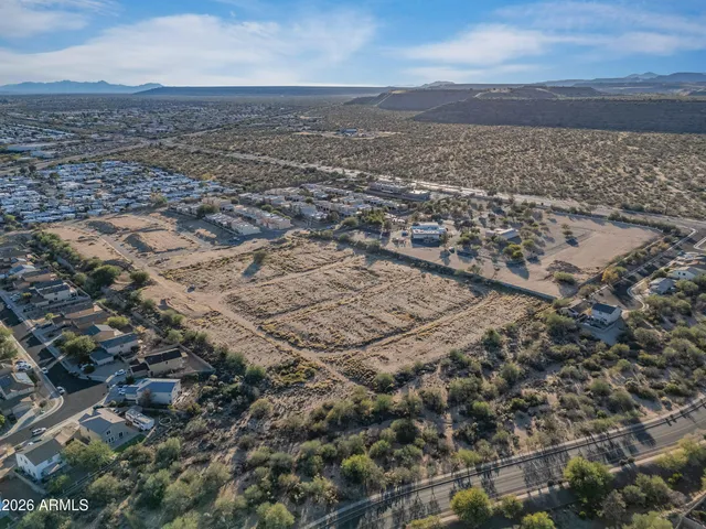 an aerial view of residential building and parking space