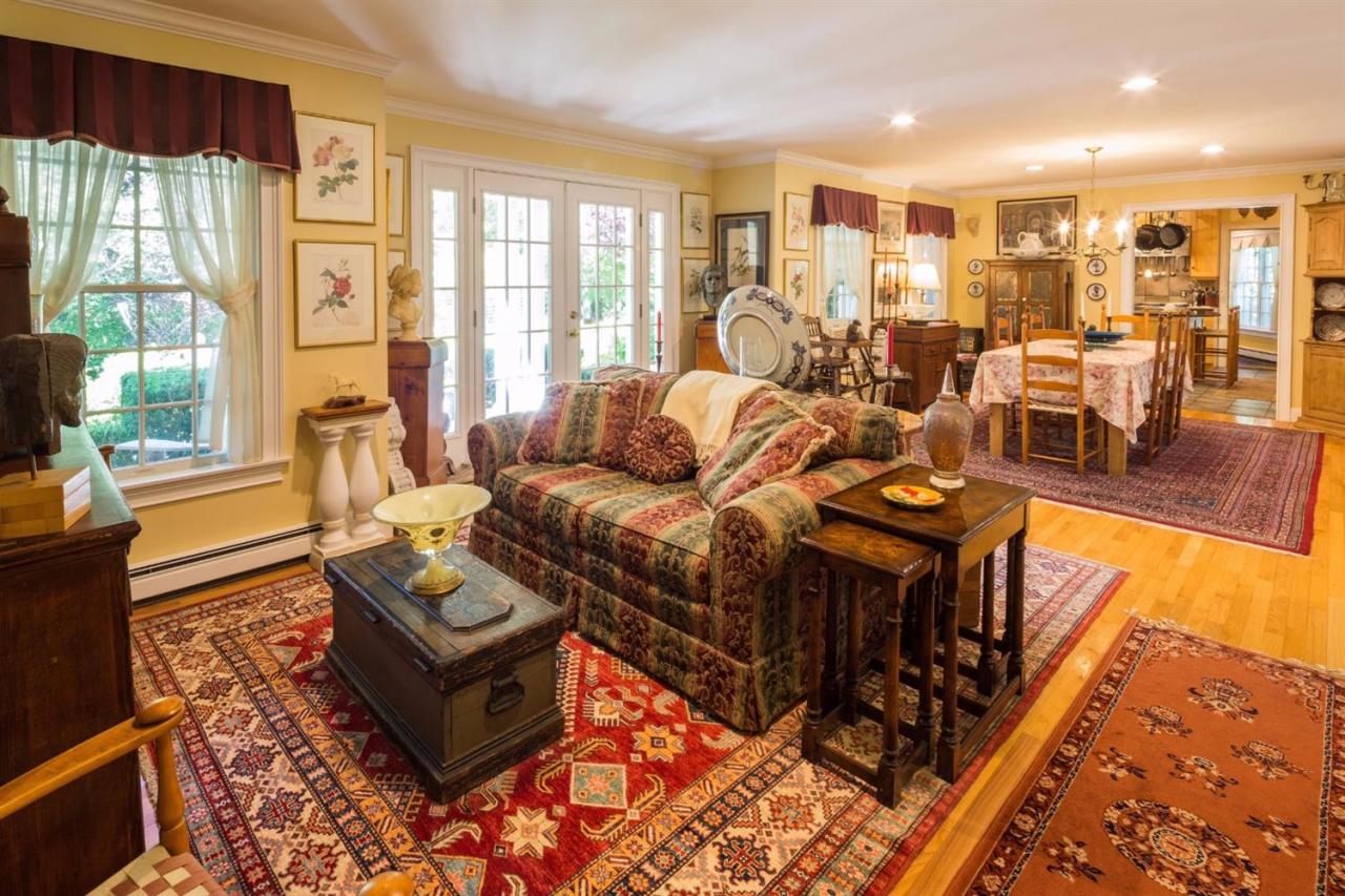 25 Sawyer Grove Road Truro, MA 02666 - Photo 32 of 34 a living room with furniture and a large window