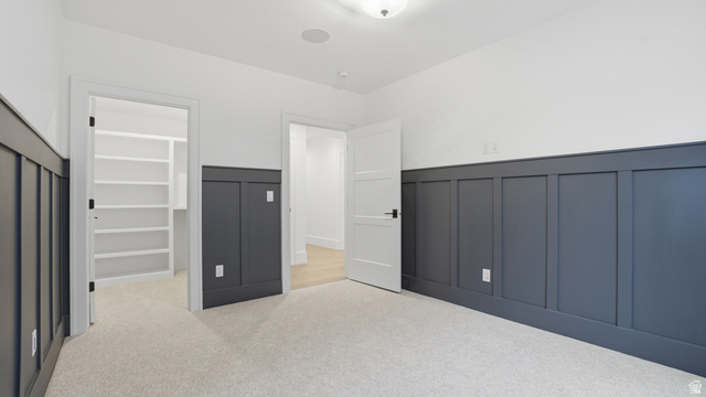 1682 North 1950 W Street, Unit 9 Provo, UT 84604 - Photo 54 of 84 Room featuring two-tone walls with lower board and batten paneling