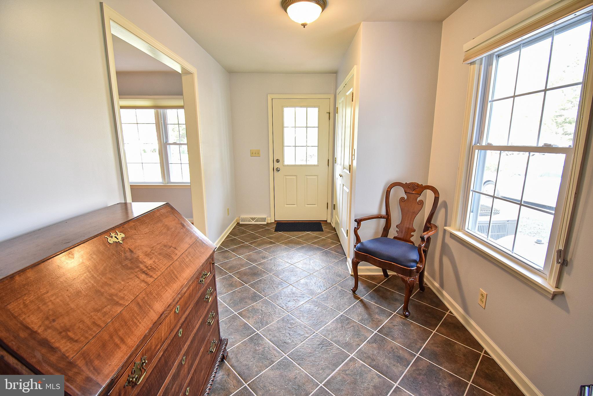 310 Cleveland Road St. Michaels, MD 21663 - Photo 3 of 42 Foyer view from kitchen to front door