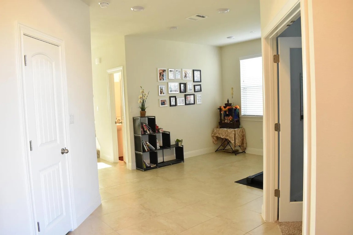 1109 Sundrops Street Leander, TX 78641 - Photo 15 of 40 a view of a room with gym equipment