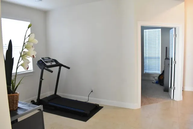 a view of a room with gym equipment