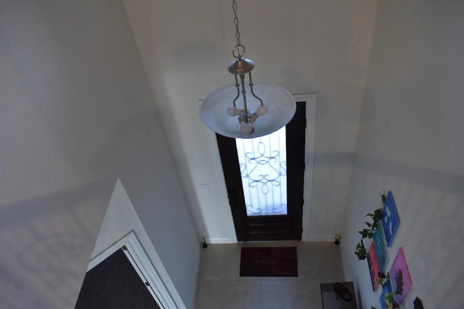 1109 Sundrops Street Leander, TX 78641 - Photo 17 of 40 a view of a hallway to a livingroom with furniture window and hallway