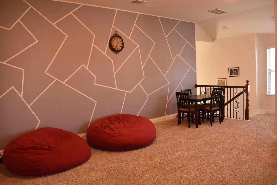1109 Sundrops Street Leander, TX 78641 - Photo 23 of 40 a view of a room with table and chairs