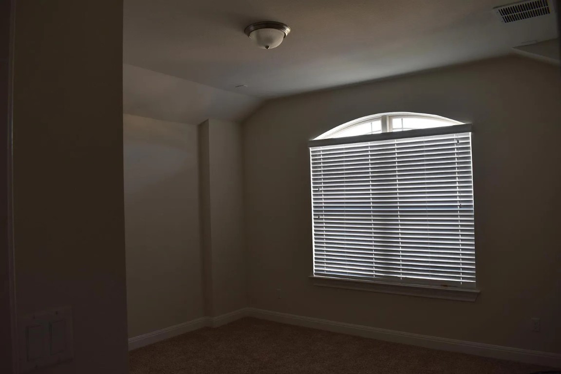 1109 Sundrops Street Leander, TX 78641 - Photo 27 of 40 an empty room with a window