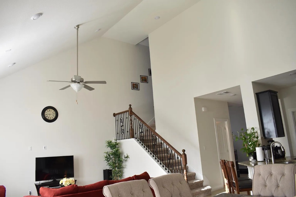1109 Sundrops Street Leander, TX 78641 - Photo 8 of 40 a view of a livingroom with furniture and staircase