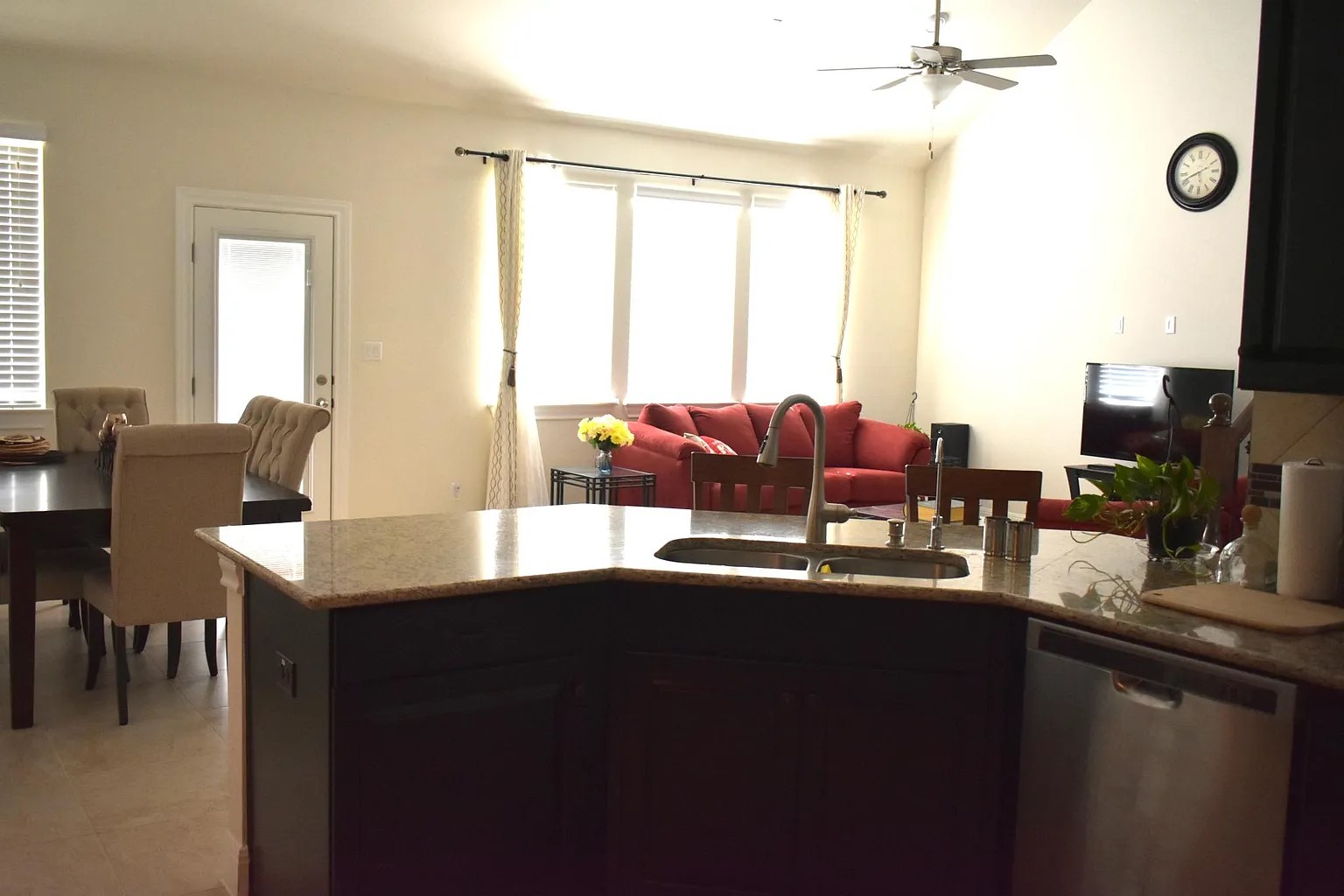 1109 Sundrops Street Leander, TX 78641 - Photo 39 of 40 a dining room with furniture a chandelier and a window