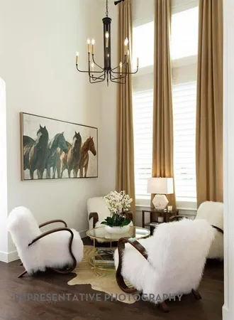 a living room with furniture and window