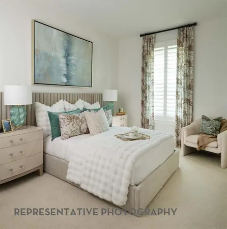 a bedroom with a bed and a couch