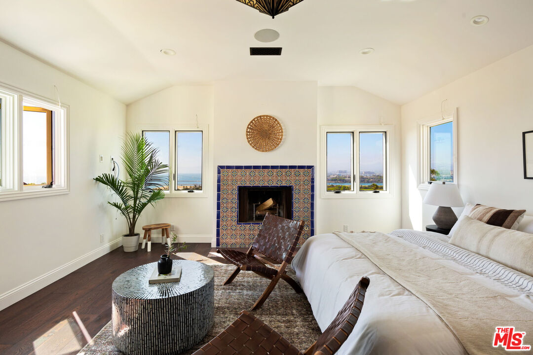 254 Rees Street Playa del Rey, CA 90293 - Photo 12 of 32 a living room with furniture and a fireplace