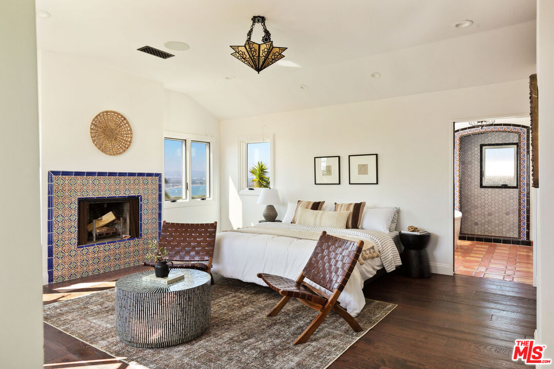 254 Rees Street Playa del Rey, CA 90293 - Photo 13 of 32 a living room with furniture and a fireplace