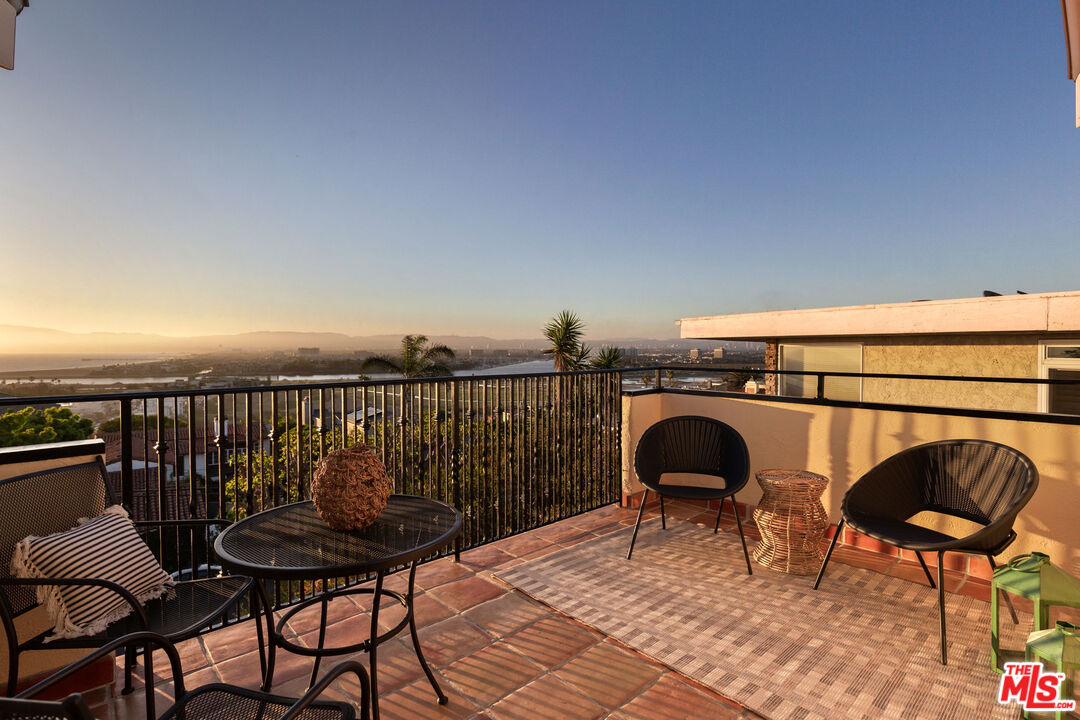 254 Rees Street Playa del Rey, CA 90293 - Photo 16 of 32 a view of a chairs and table in patio
