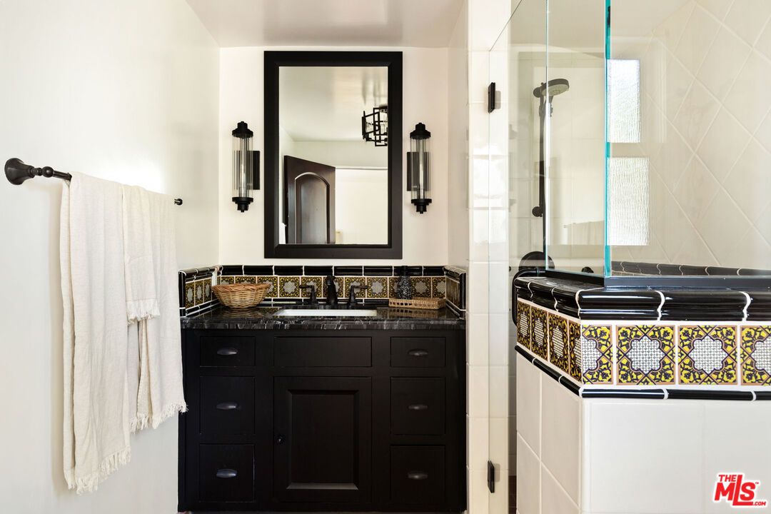 254 Rees Street Playa del Rey, CA 90293 - Photo 20 of 32 a kitchen with a sink and a mirror