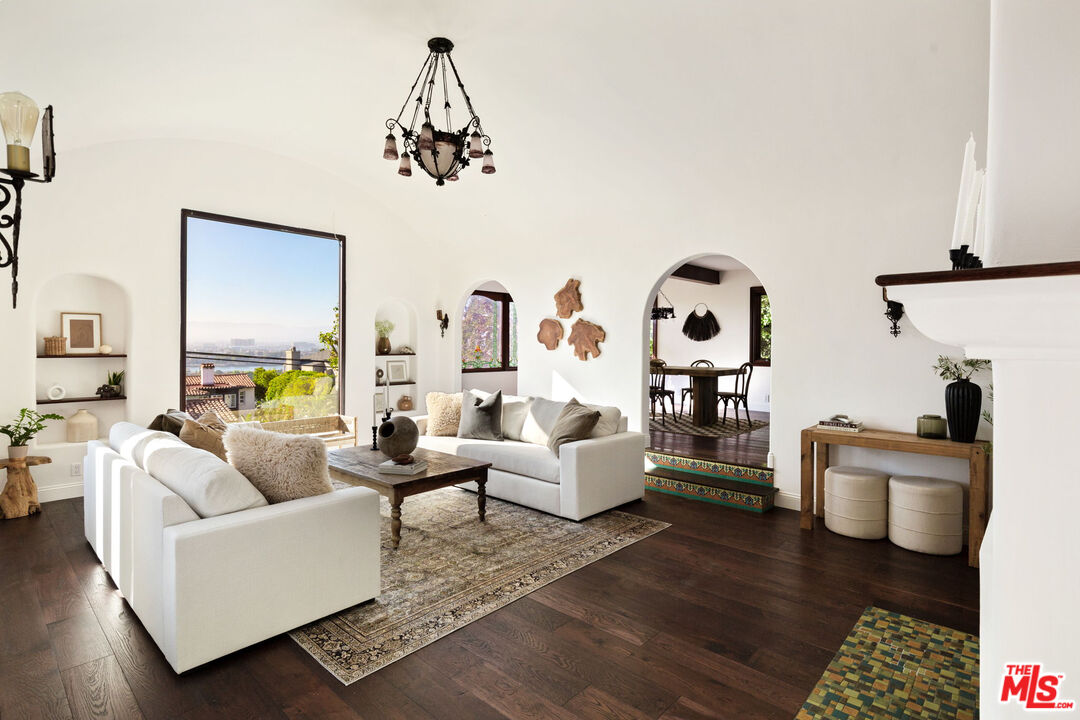 254 Rees Street Playa del Rey, CA 90293 - Photo 5 of 32 a living room with furniture and a chandelier