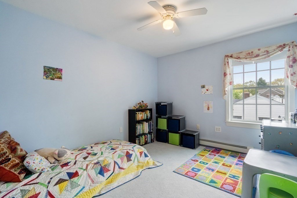 14 Rutledge Road Natick, MA 01760 - Photo 24 of 39 a bedroom with a bed and a window
