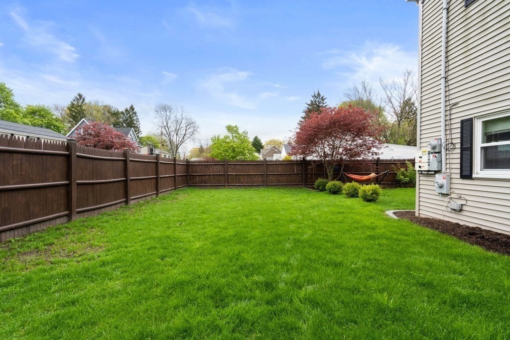 14 Rutledge Road Natick, MA 01760 - Photo 32 of 39 a view of a backyard with wooden fence