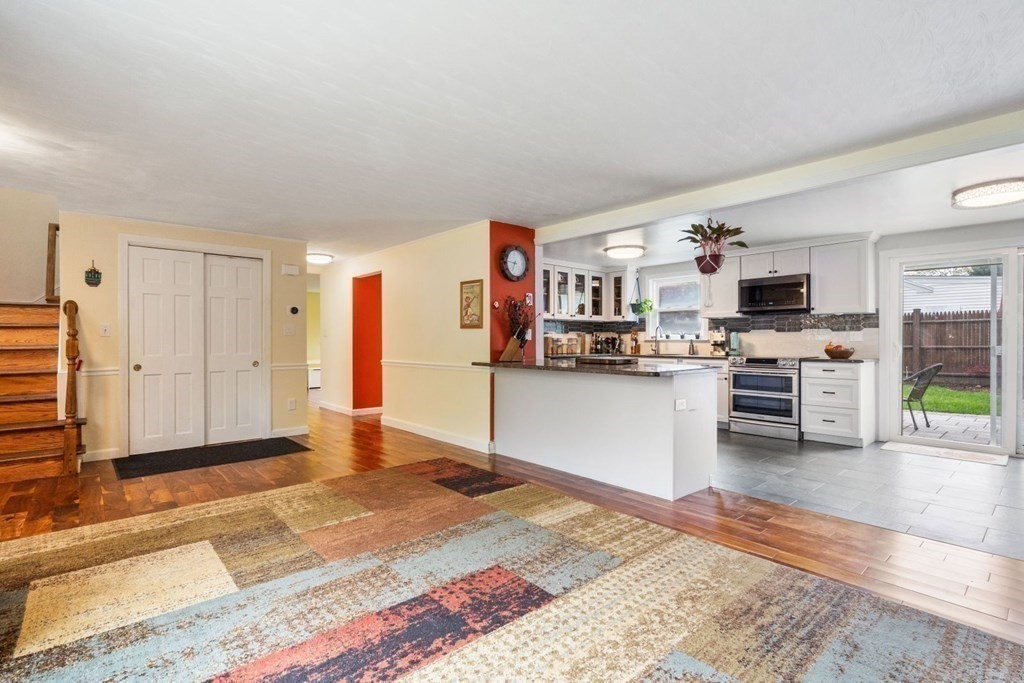 14 Rutledge Road Natick, MA 01760 - Photo 6 of 39 a view of a living room kitchen and a window