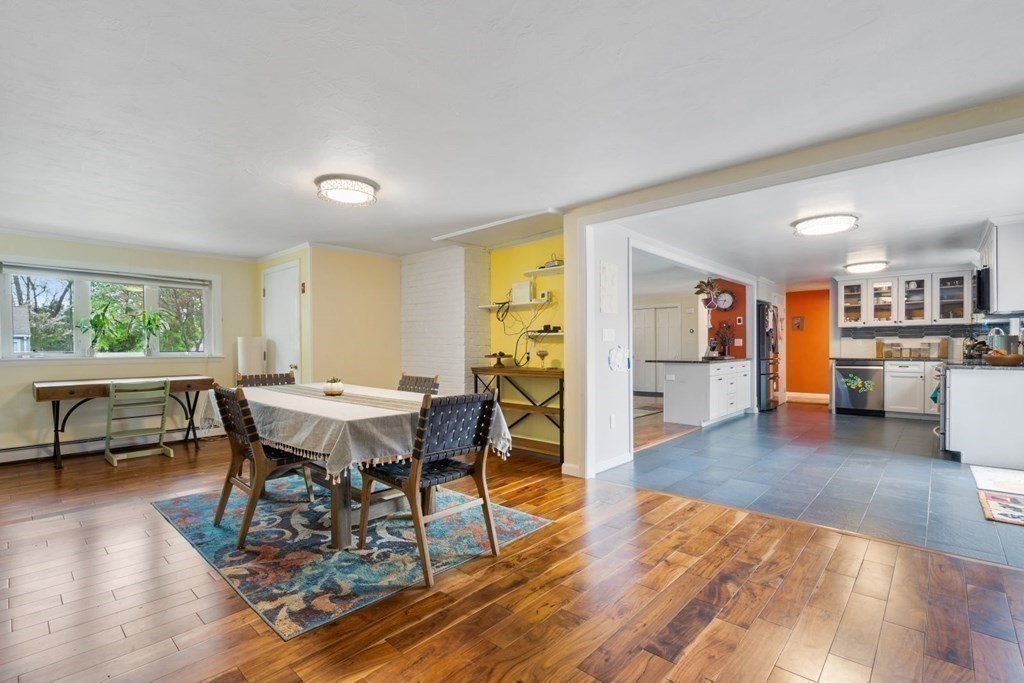 14 Rutledge Road Natick, MA 01760 - Photo 9 of 39 a view of a dining room with furniture and wooden floor
