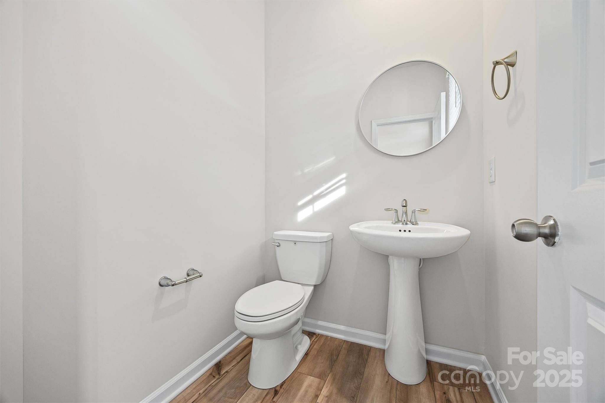 5038 Moss Pne Way Fort Mill, SC 29708 - Photo 11 of 25 a bathroom with a sink toilet and a mirror