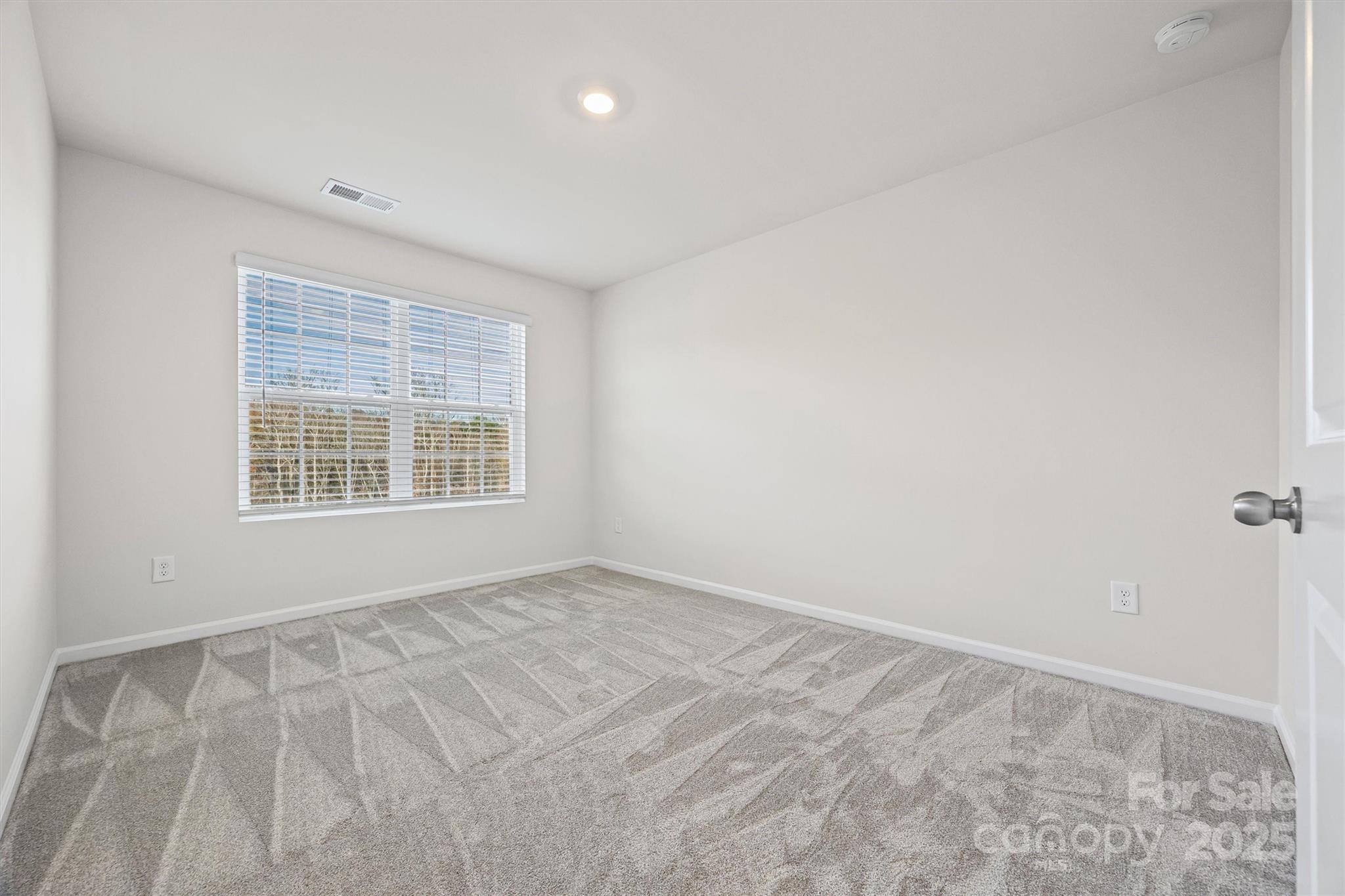 5038 Moss Pne Way Fort Mill, SC 29708 - Photo 20 of 25 a view of an empty room with a window