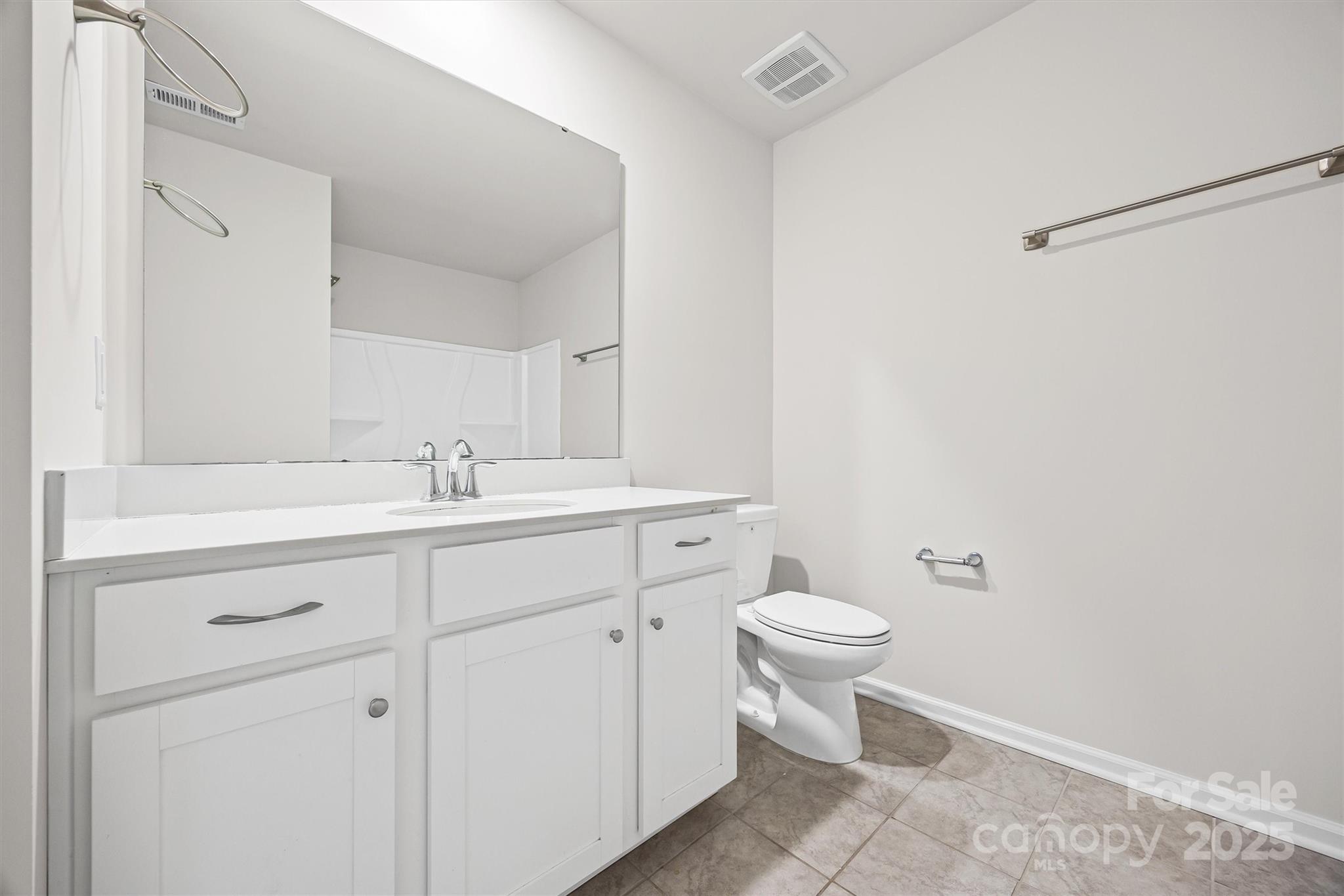 5038 Moss Pne Way Fort Mill, SC 29708 - Photo 22 of 25 a bathroom with a sink toilet and a mirror