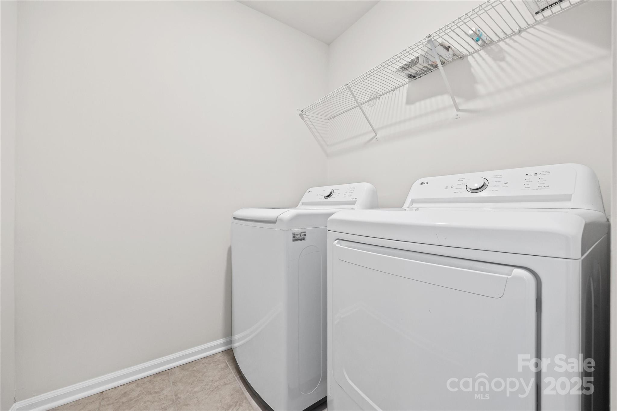 5038 Moss Pne Way Fort Mill, SC 29708 - Photo 23 of 25 a utility room with dryer and washer