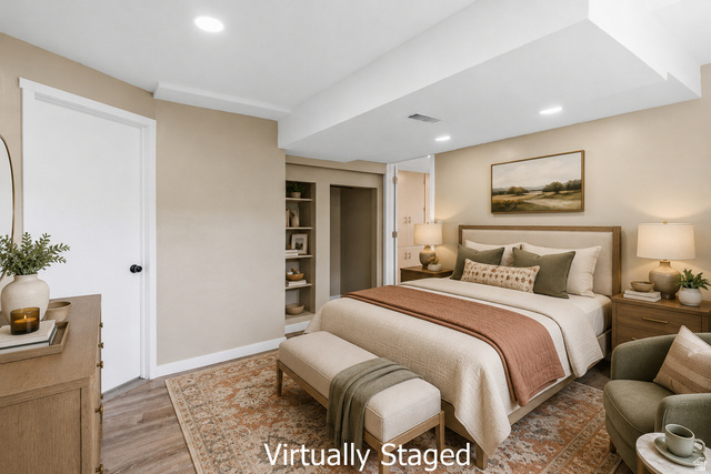 2693 Teal Way Sandy, UT 84093 - Photo 33 of 50 Recessed lighting illuminates this room featuring light wood-finish flooring