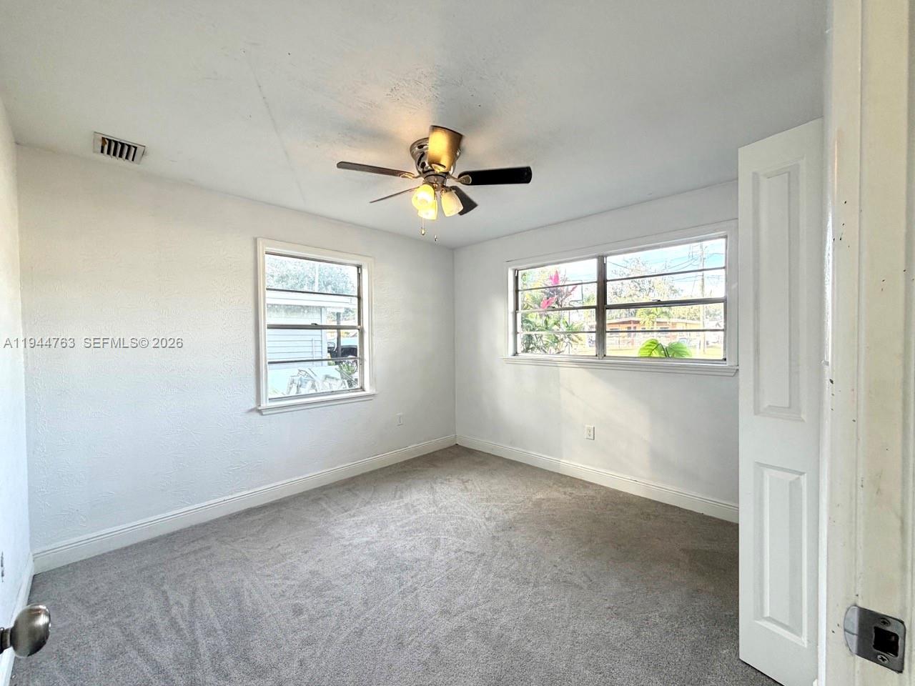 565 Forrest Drive Bartow, FL 33830 - Photo 17 of 44 a view of an empty room with a window