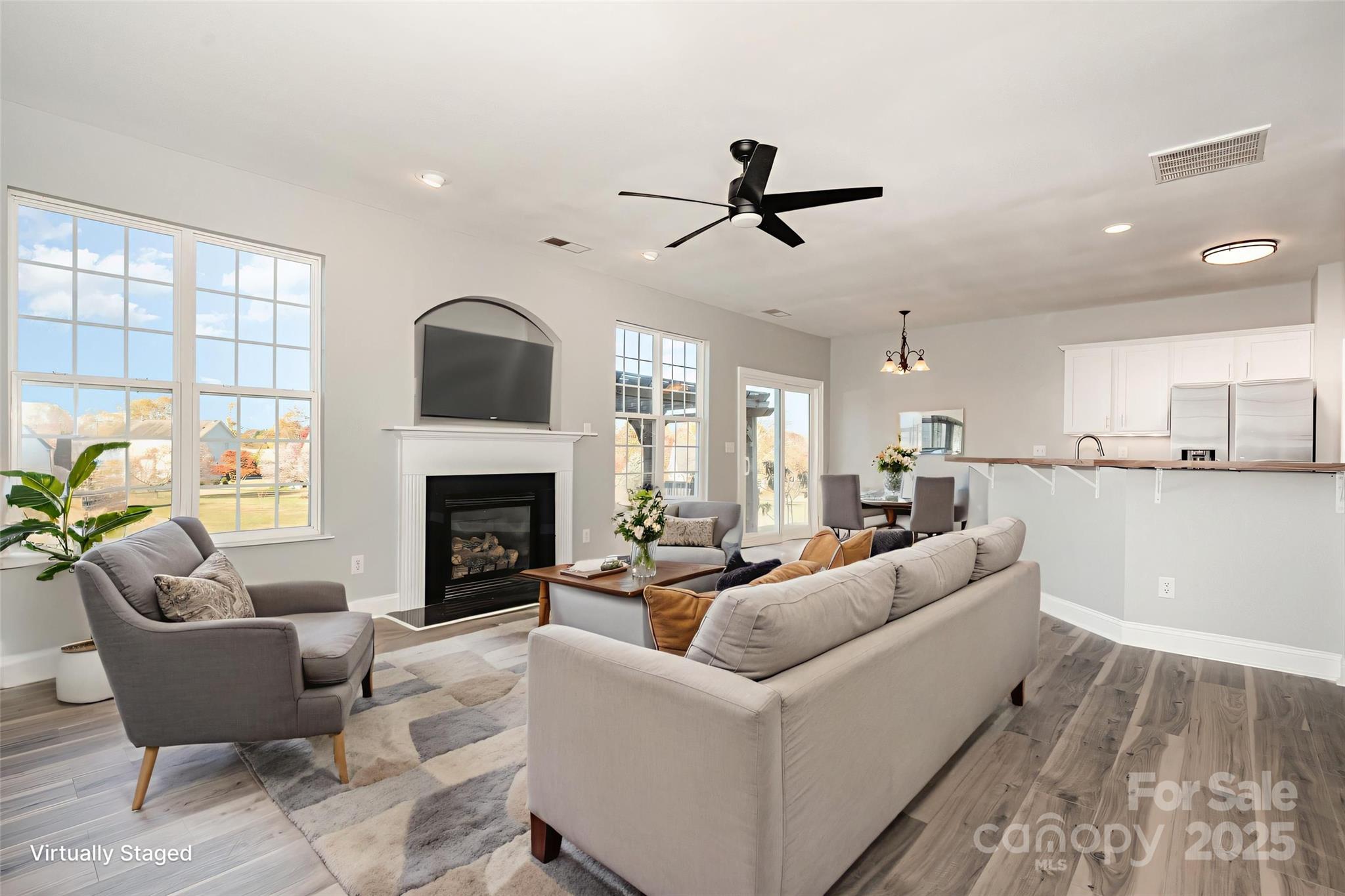 1457 Jc Raulston Court Hickory, NC 28602 - Photo 17 of 39 a living room with furniture and a fireplace