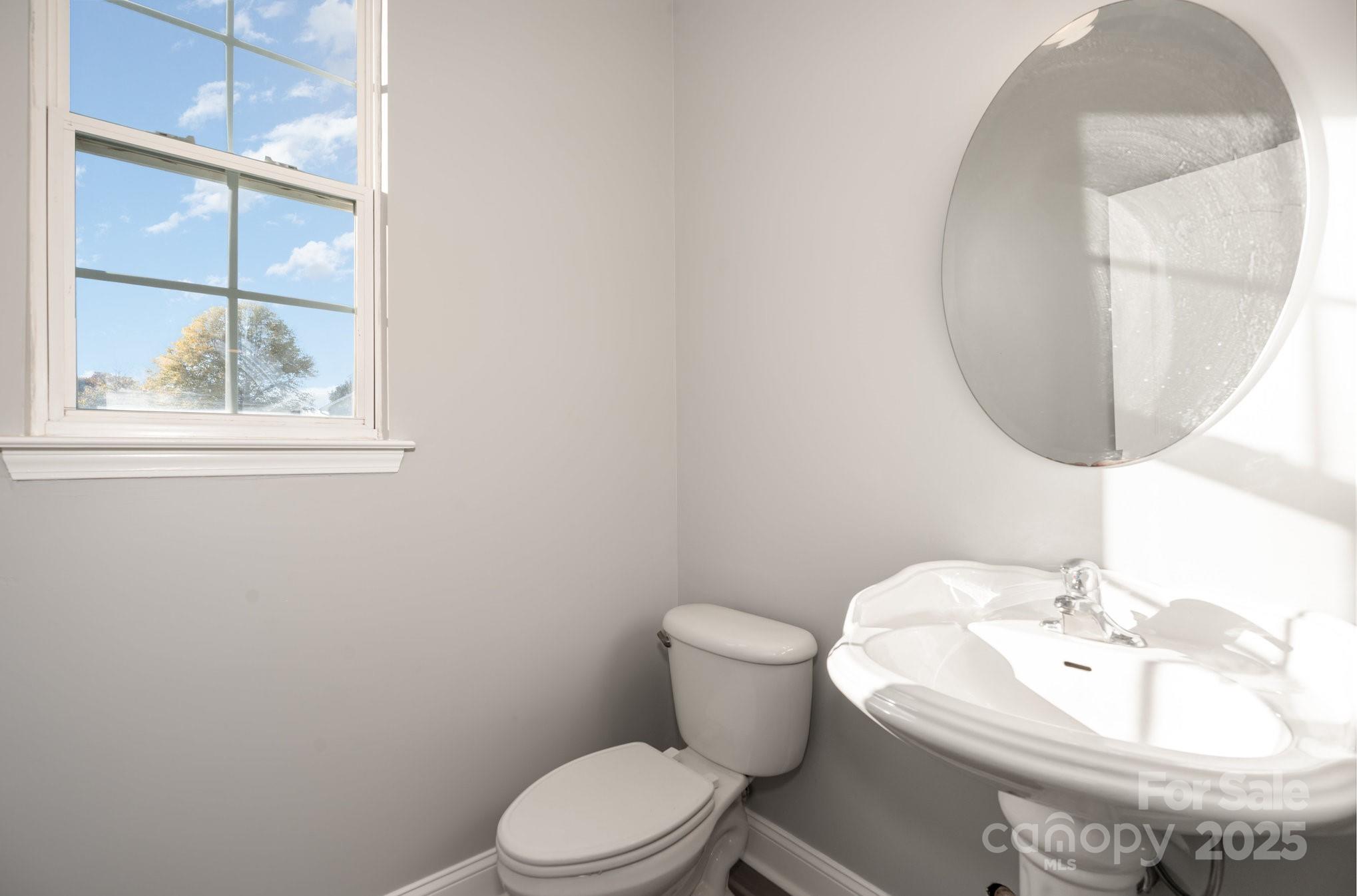 1457 Jc Raulston Court Hickory, NC 28602 - Photo 19 of 39 a bathroom with a sink and a mirror