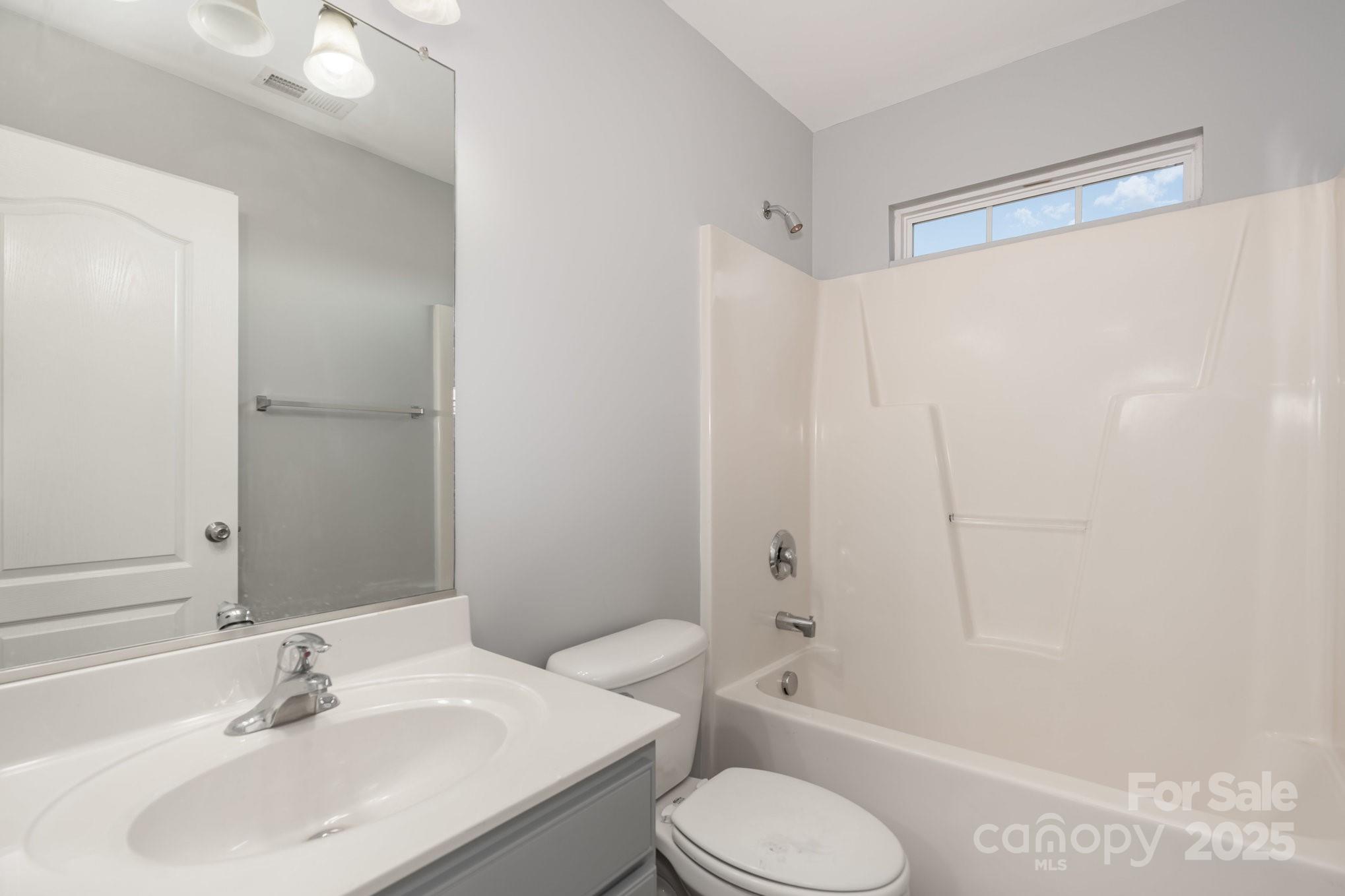 1457 Jc Raulston Court Hickory, NC 28602 - Photo 22 of 39 a bathroom with a sink toilet and shower