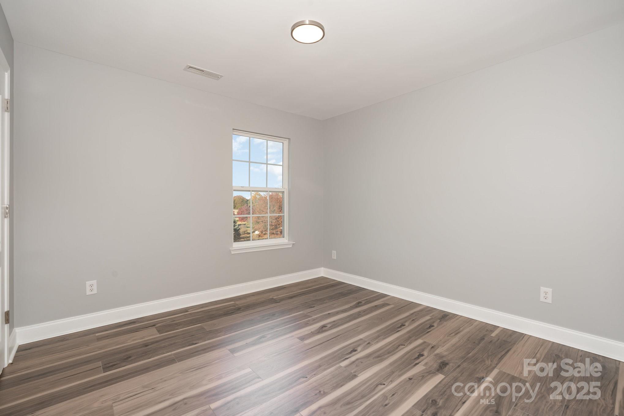 1457 Jc Raulston Court Hickory, NC 28602 - Photo 23 of 39 an empty room with a window